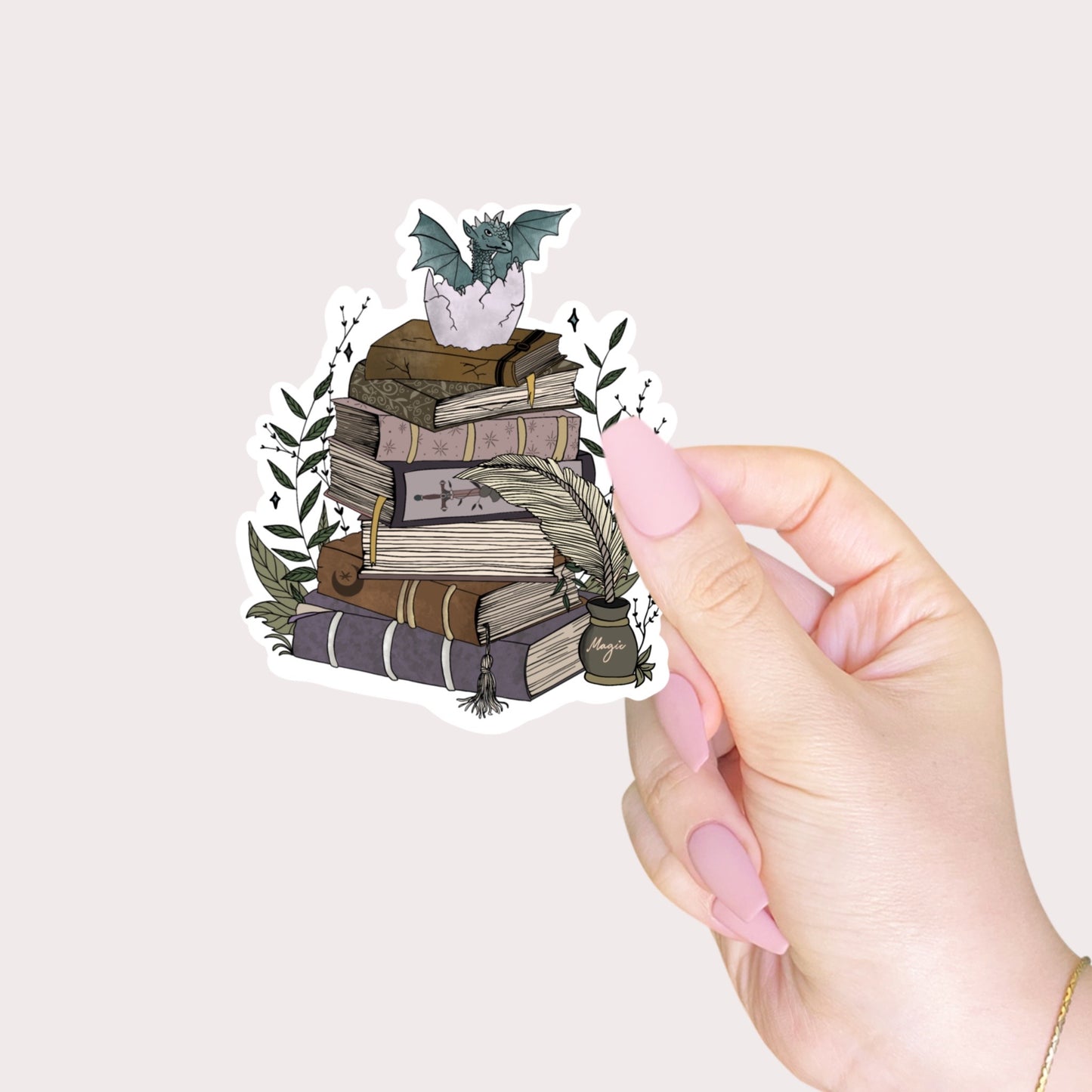 Book stack and baby dragon sticker