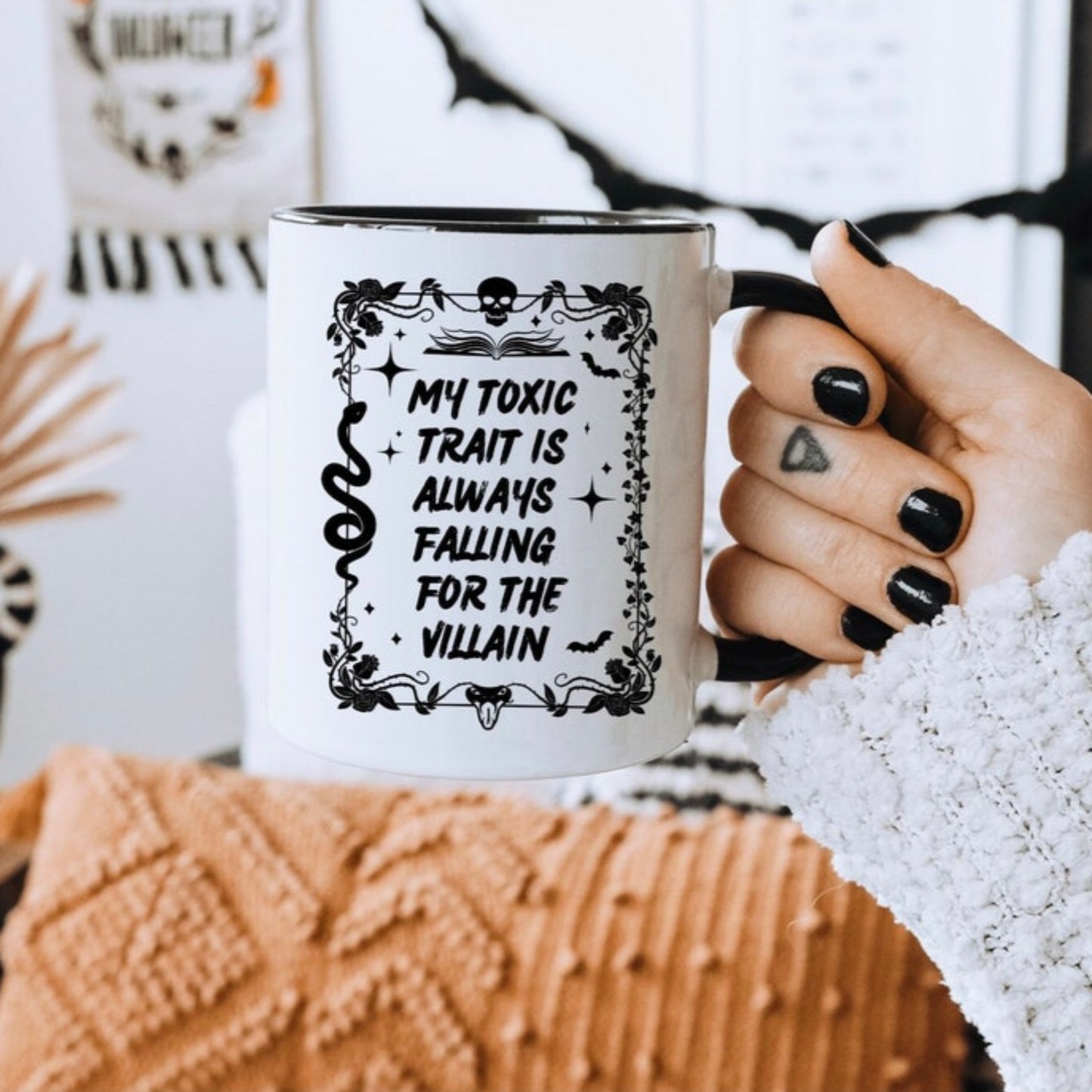 Falling for the villain ceramic mug with black handle