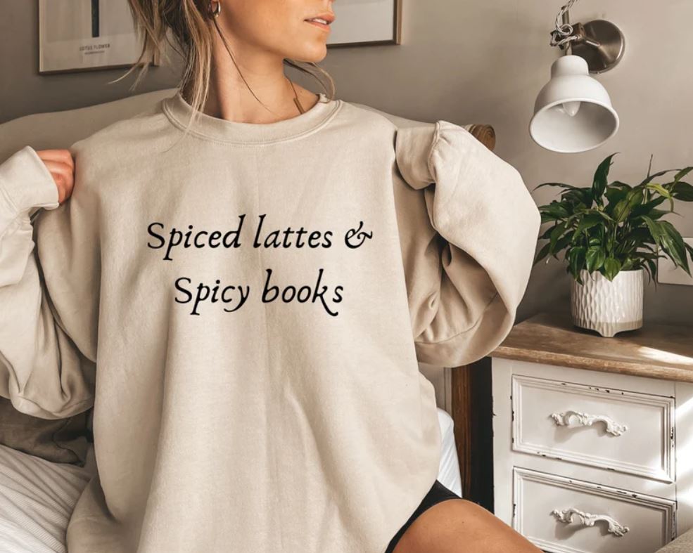 Spiced lattes and spicy books crewneck sweatshirt