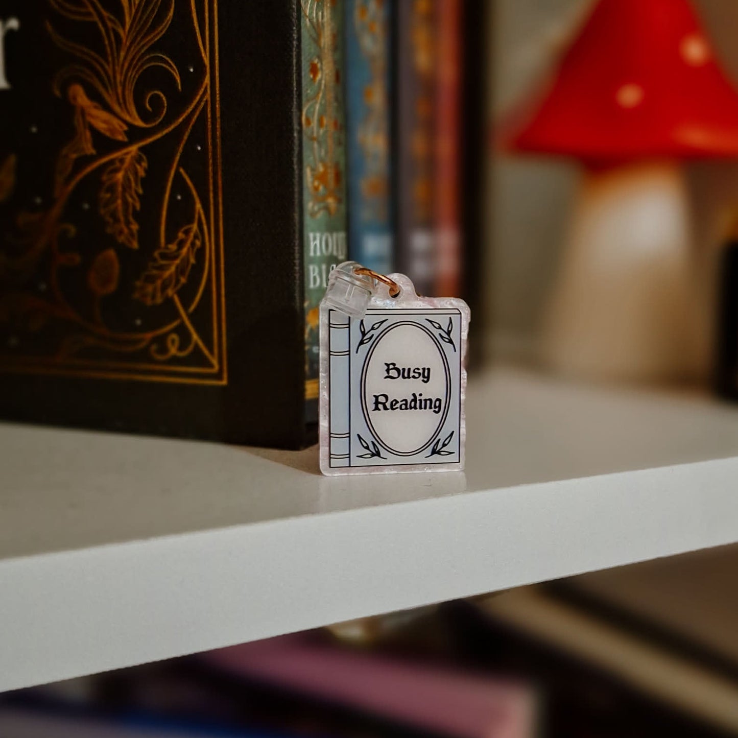 Busy reading kindle/phone charm - leftover from 2025 advent calendar