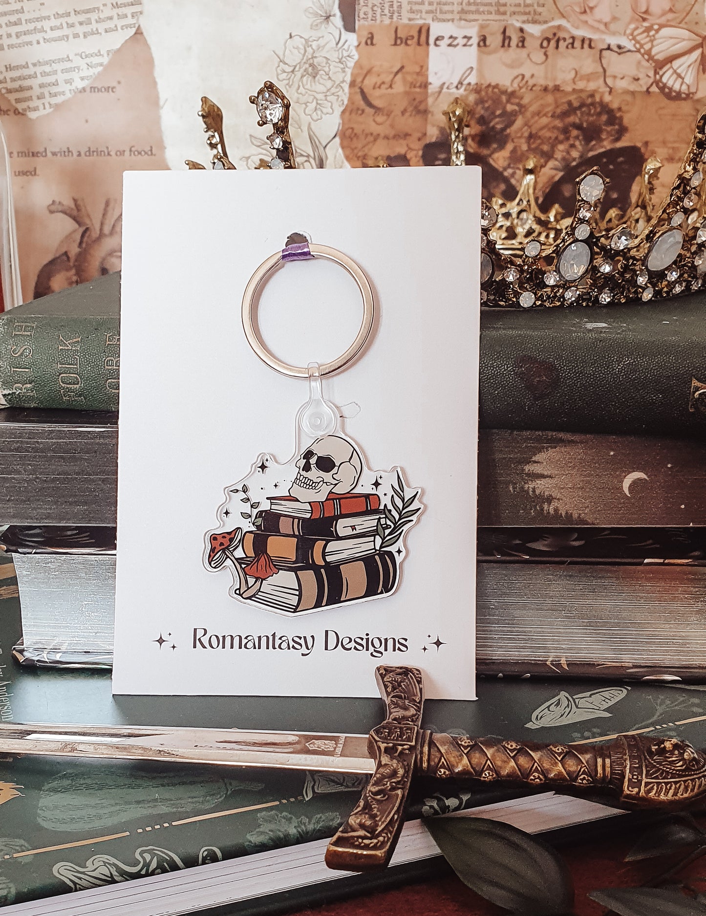 Dark academia book stack and skull keychain