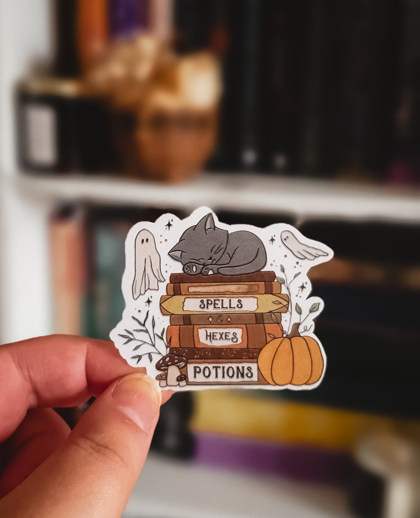 Halloween book stack, cat and ghosts sticker