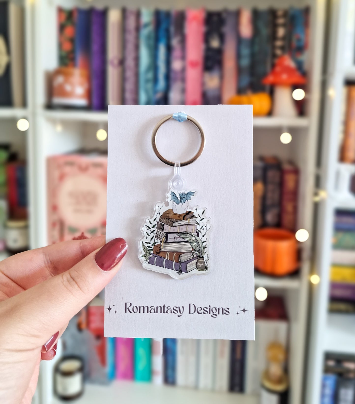 Book stack and dragon keyring