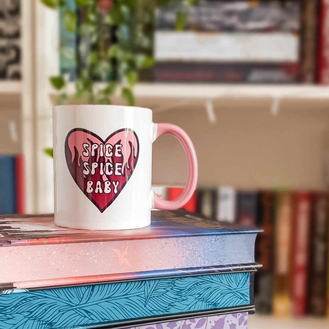 Spicy books 11oz ceramic mug with pink handle