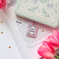 Busy reading kindle/phone charm dust plugs - leftover from 2025 advent calendar