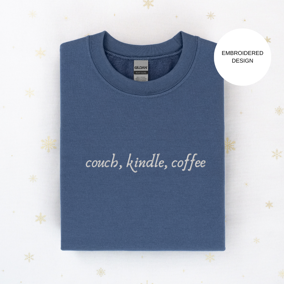 couch, books, coffee embroidered sweatshirt