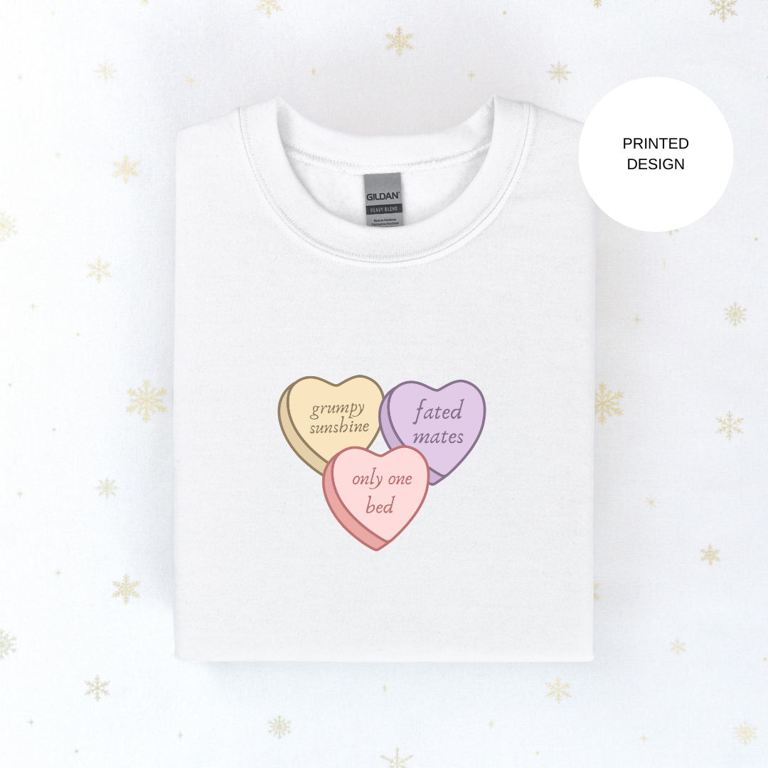 book trope conversation hearts sweater