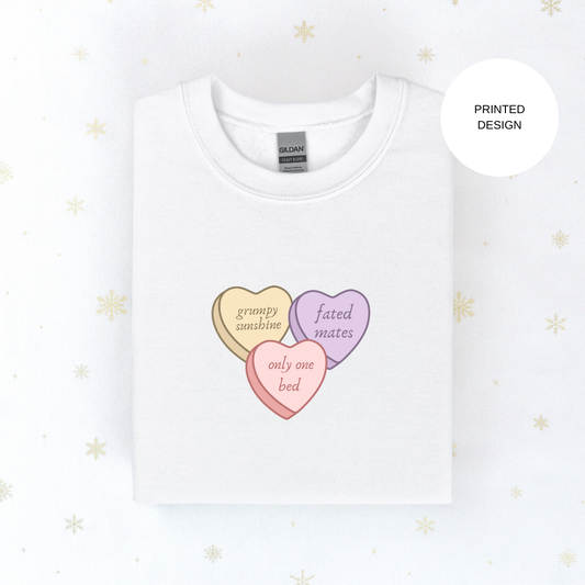 book trope conversation hearts sweater
