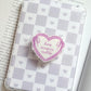 Busy escaping reality heart shaped kindle/phone grip