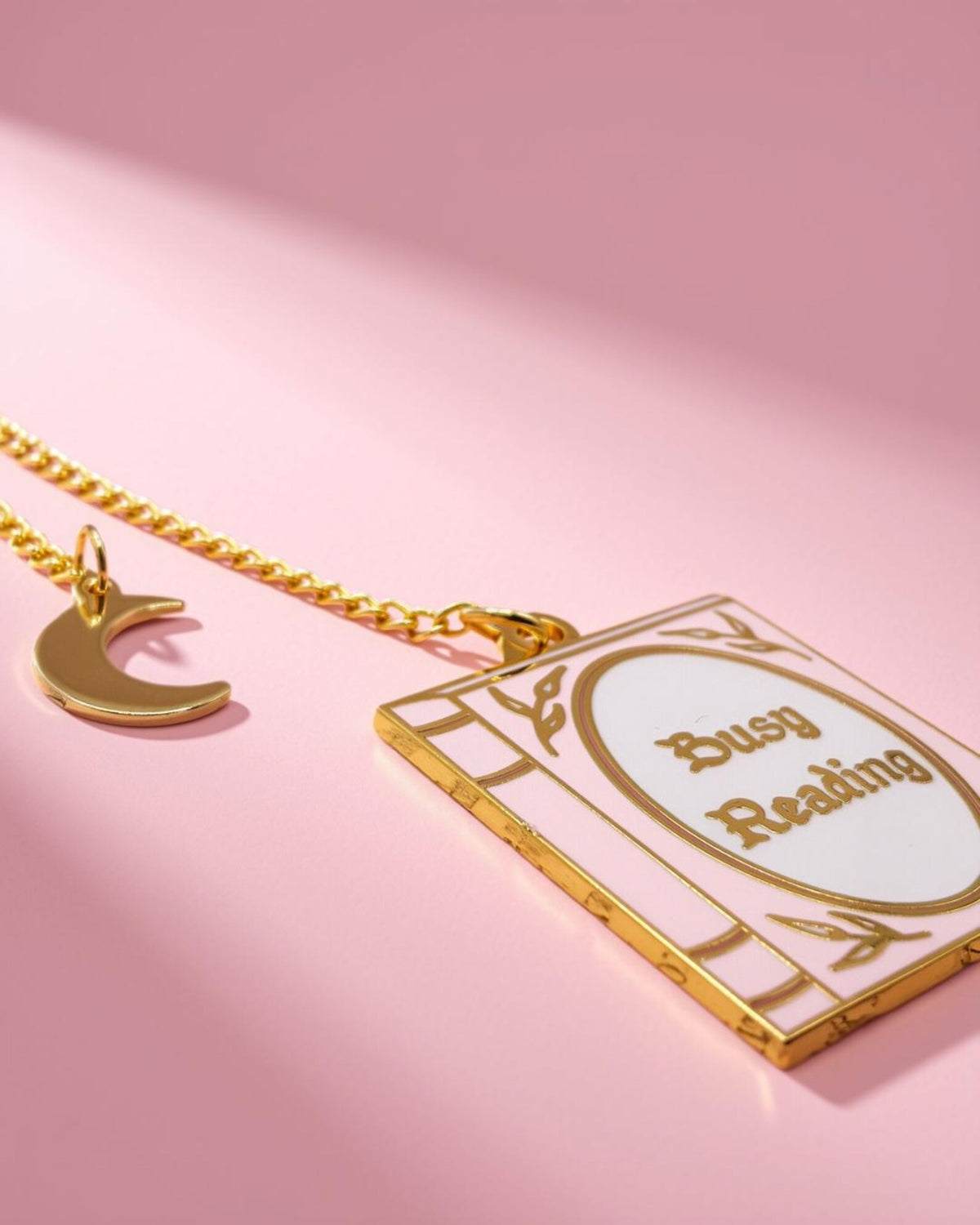 Busy reading pink and gold enamel kindle/phone charm