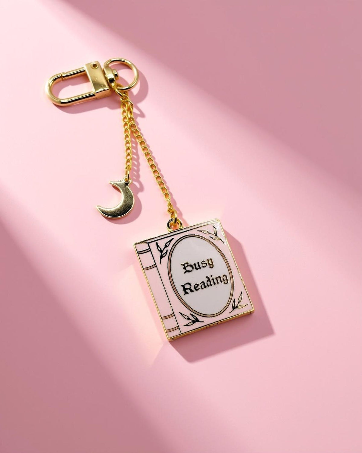 Busy reading pink and gold enamel kindle/phone charm