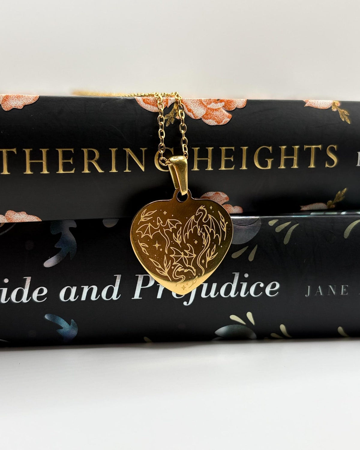 Gold plated heart shaped dragon engraved necklace