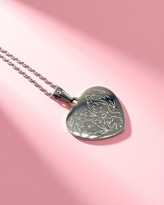 Silver colour heart shaped dragon engraved necklace