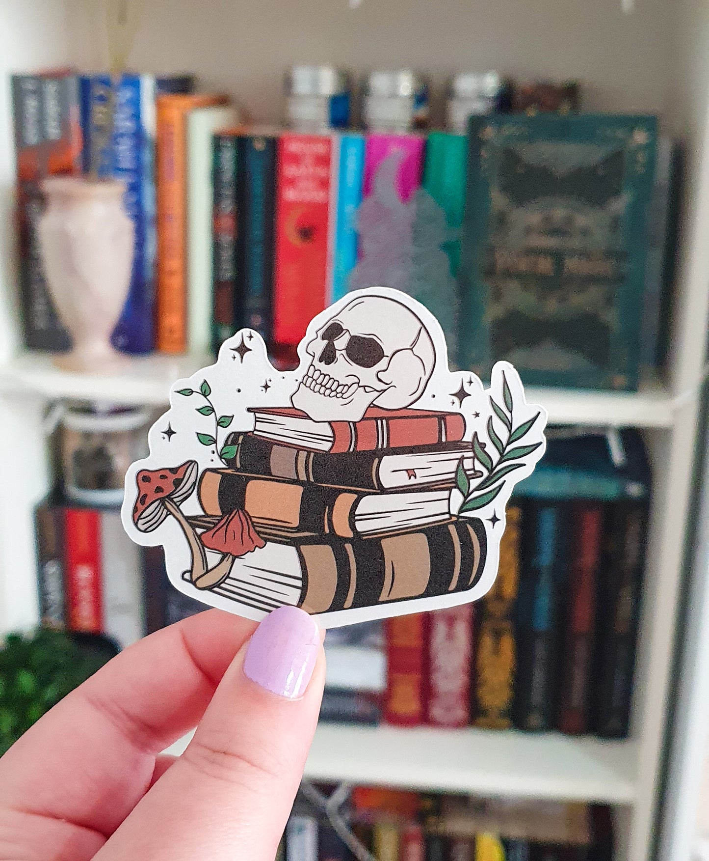 Book stack skull and mushrooms sticker