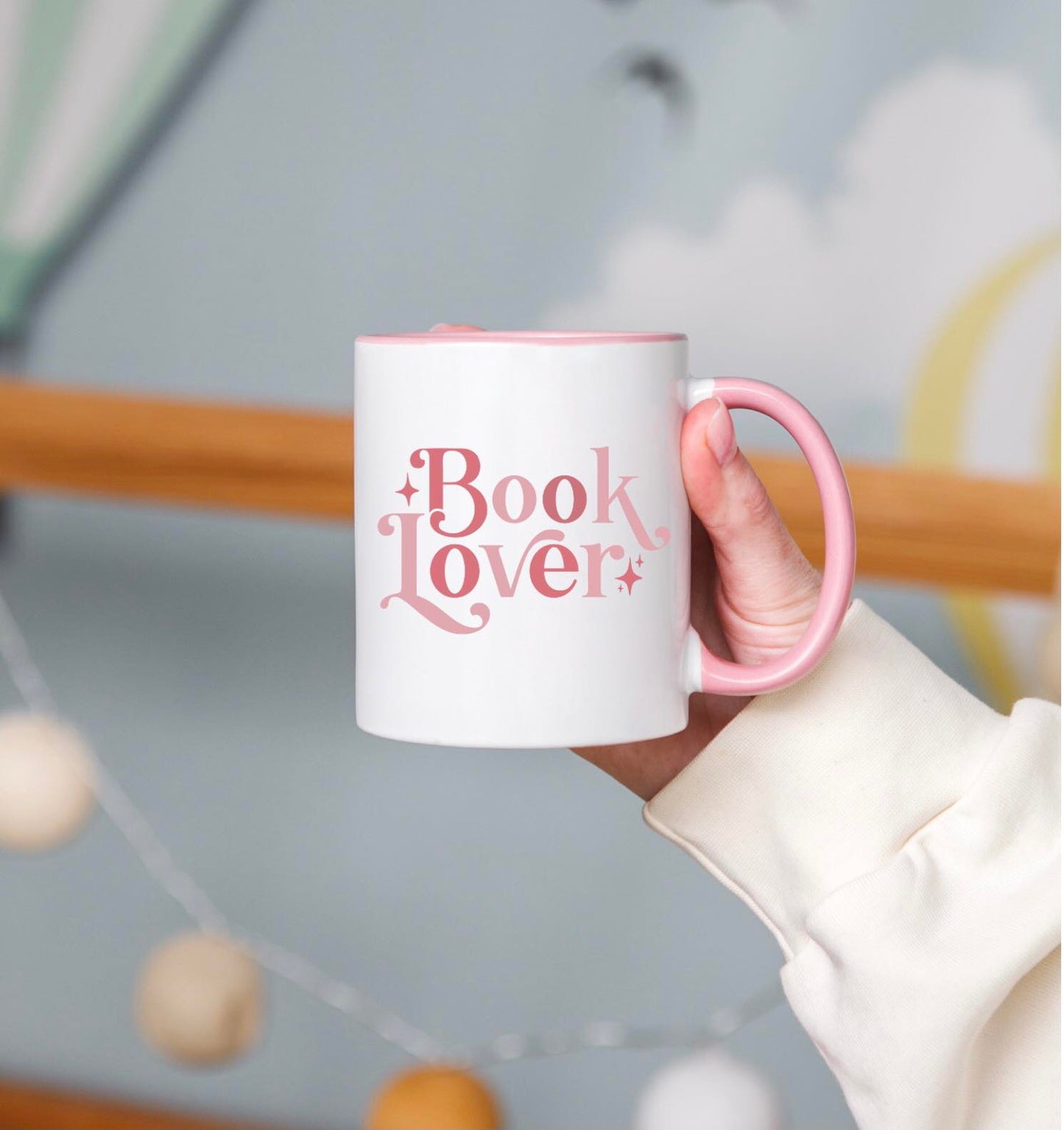 Book Lover 11oz ceramic mug with pink handle and inside